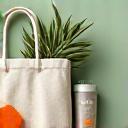 Eco-friendly products like reusable bags, bamboo utensils, and natural cleaning supplies